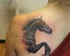 Jumping horse tattoo
