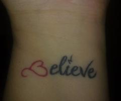 Pink heart believe tattoo