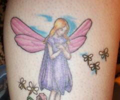 Fairy world leg tattoo art