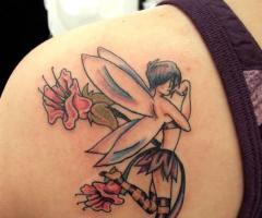 Feminine fairy tattoo for back shoulder