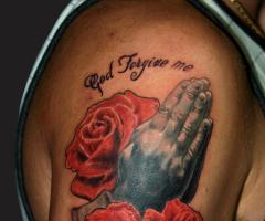 praying hands tattoo
