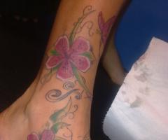 Flores en el pie