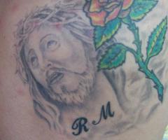 Rostro de Jesus con iniciales