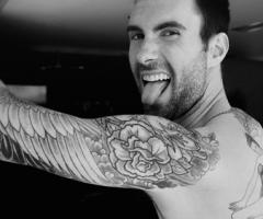 Adam Levine arm sleeve tattoo