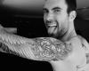 Adam Levine arm sleeve tattoo