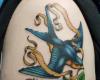http://www.tattooset.com/images/tattoo/2012/07/12/6058-golondrina-con-rosa_tiny.jpg