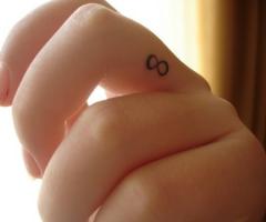 Small and simple but infinite