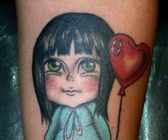 Niña con globo