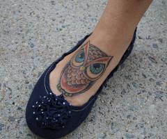 Tatuaje de Buho en el pie