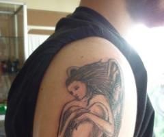 Angel woman tattoo
