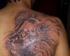 Tattoo de Leon en la espalda