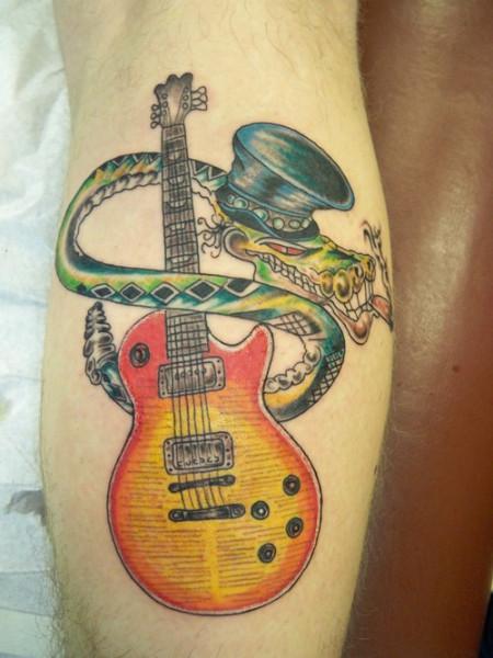 Slash as snake guitar tattoo