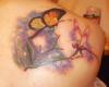 Tatuaje de insectos en la espalda