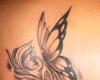 Mariposa de perfil con iniciales
