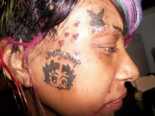 Tatts on her face