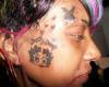 Tatts on her face