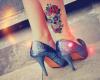 http://www.tattooset.com/images/tattoo/2012/07/22/6834-caveira_tiny.jpg