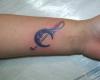 http://www.tattooset.com/images/tattoo/2012/07/23/6894-moon-and-music-notes_tiny.jpg