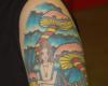 Alice in Wonderland sleeve woman tattoo