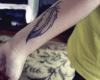 Feather on forearm