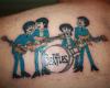 The Beatles tattoo on shoulder