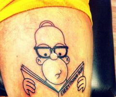Homer Simpson reading a book