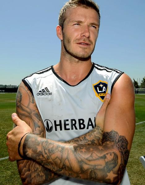 Ambos brazos tatuados de David Beckham