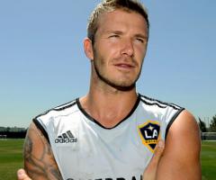 Ambos brazos tatuados de David Beckham