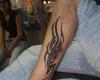 Tatuaje tribal en la pierna, tobillo y pie