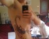 Scorpion tattoo on ribs