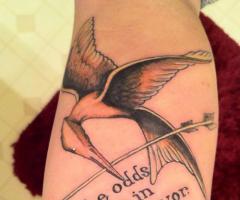 Hunger Games series Mockingjay Tattoo