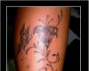 Tatuagem flor de lotus e borboleta