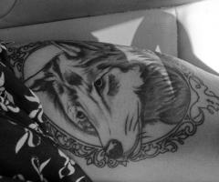 Wolf face tattoo