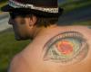 Eye colour back tattoo