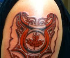 Canadian Flag in the Taurus sign tattoo