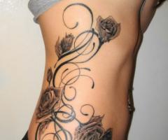 Ribs flowers tattoos