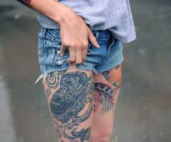 Owl tattoo on leg