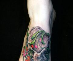 Flowers and skull on foot