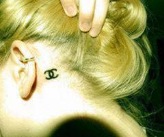 Chanel log tattoo