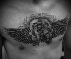 Faces de calavera con alas y perspectiva