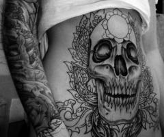 big skull girl tattoo
