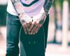 Skateboarding guy tattooed