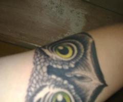 Buho on left arm