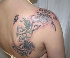 Dark shaded floral and vine design with sweet tribal touch