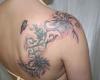 Dark shaded floral and vine design with sweet tribal touch