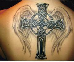 Traditional Cross with angel wings and Celtic knot pattern