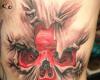 It's a massive 3D style red skull ripping out from his side back