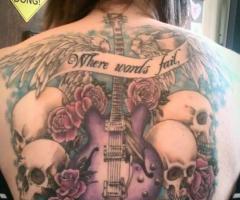 Where words fail, music speaks with skulls, roses and wings
