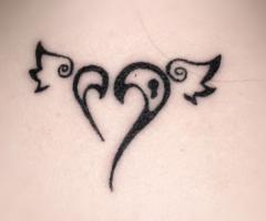 Sweet and simple tribal sacred heart with angel wings