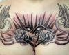 A bold chest piece of a heart with wings to impress your true love